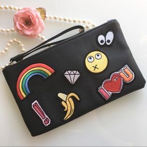 MNG mango emoji clutch.